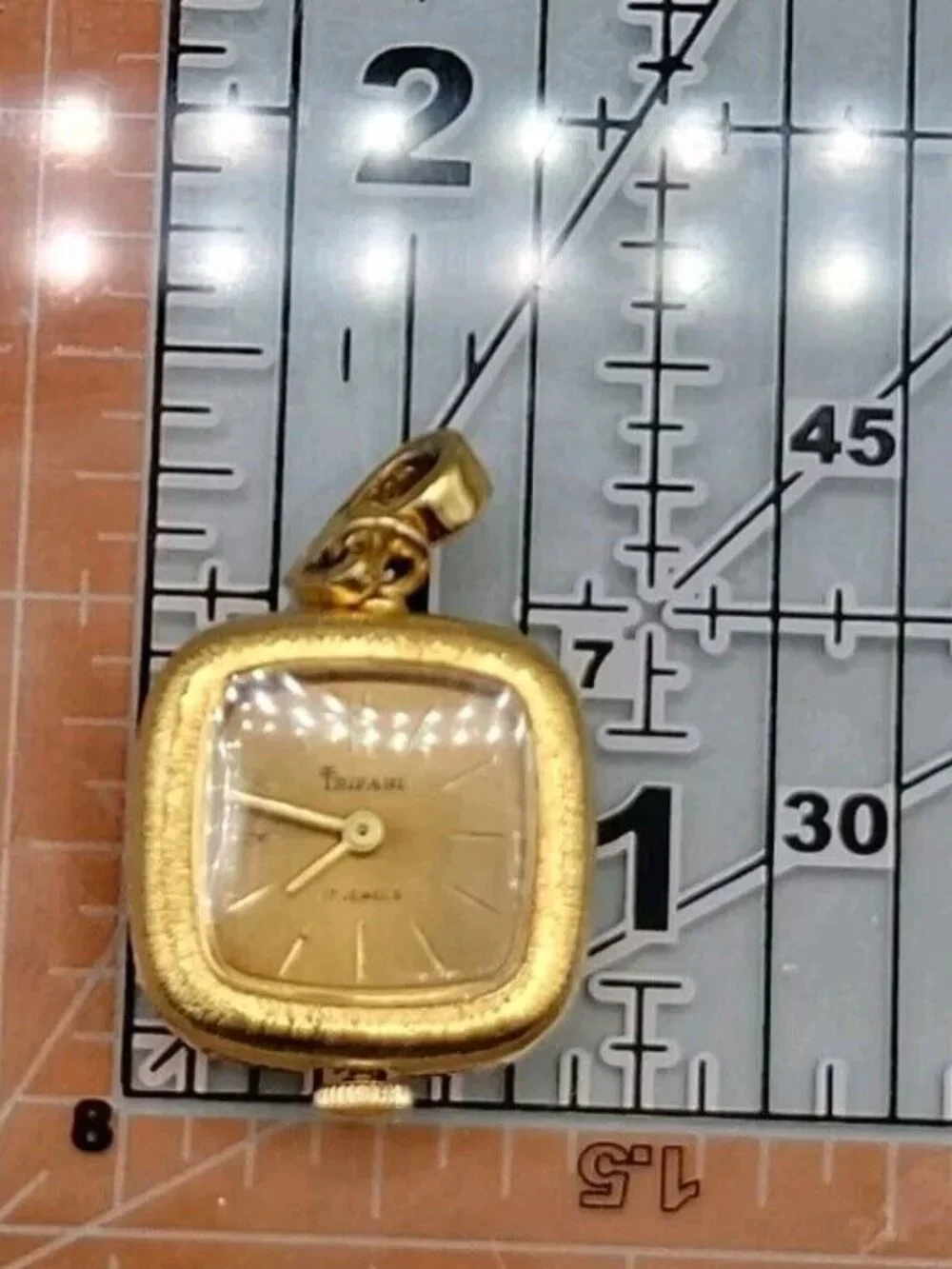 Trifari crown pendant